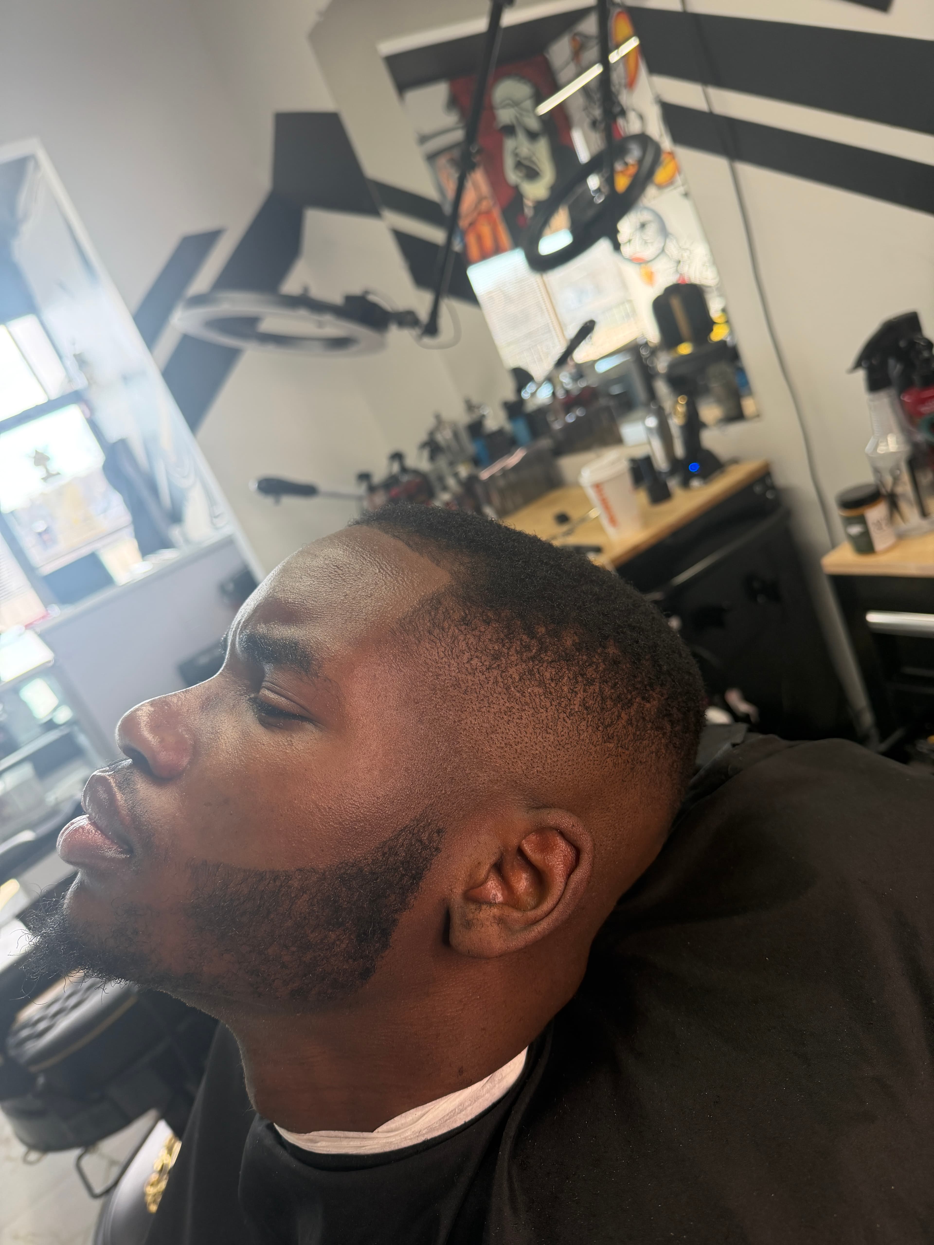 Beard trim and shape-up by Juju Fades at Aces Barbershop