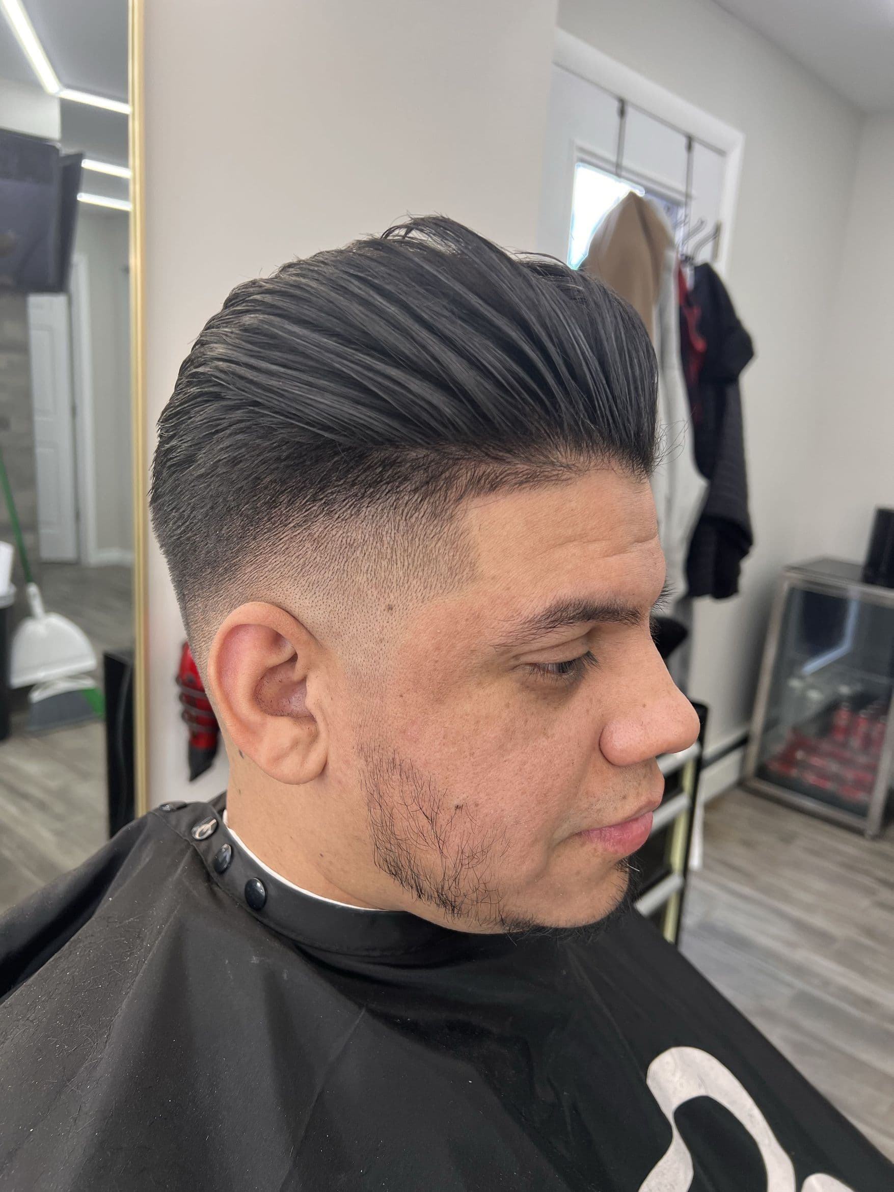 Slicked haircut by LooksBySerge from Booksy portfolio