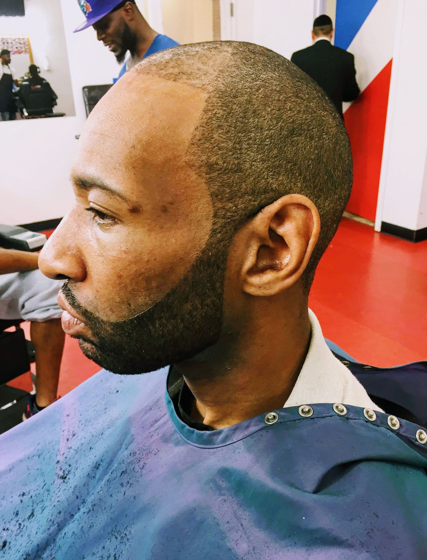 DJ BEESIDE, barber at Aces Barbershop in North Providence, RI