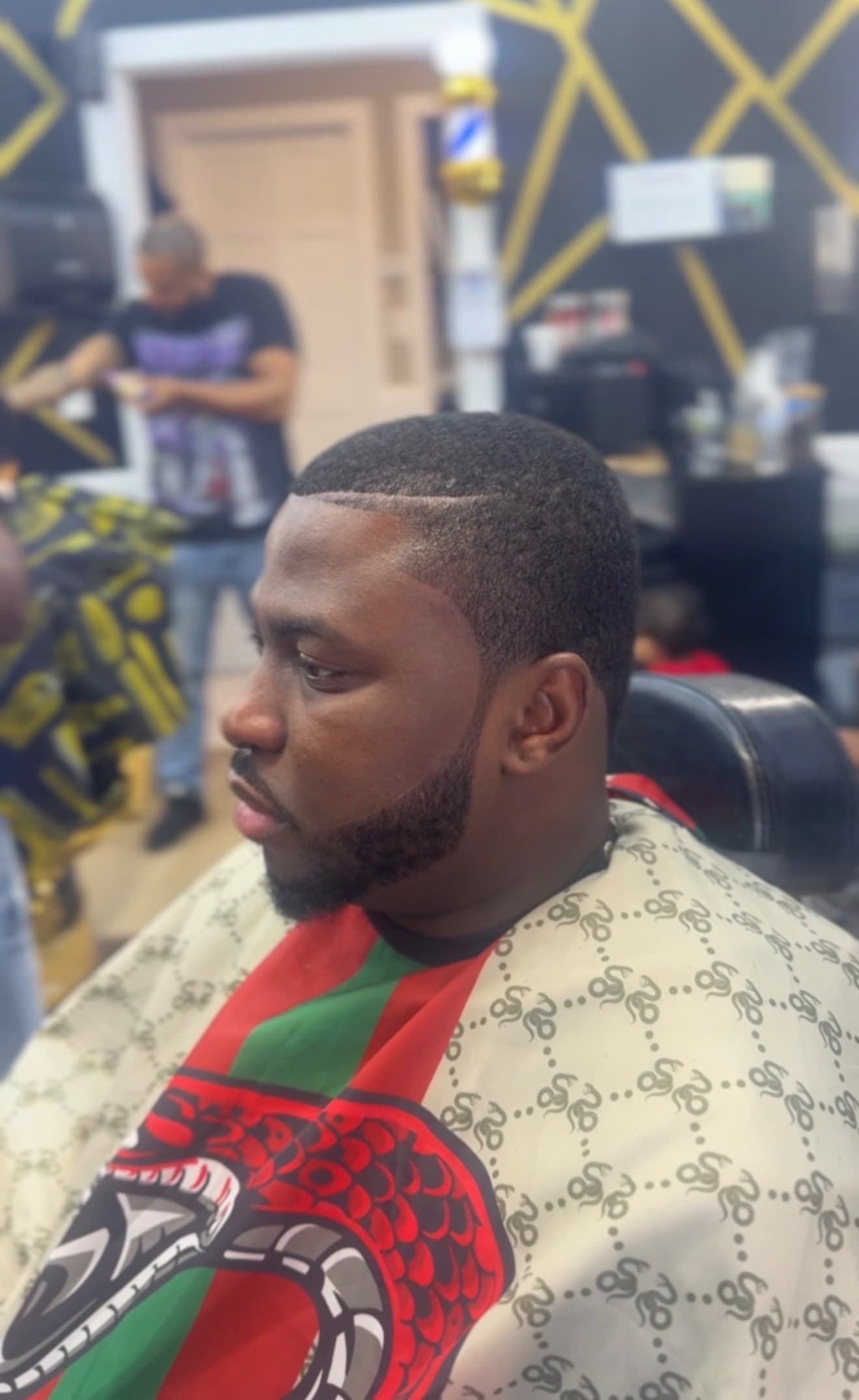 Haircut with beard lineup by Mermelada at Aces Barbershop