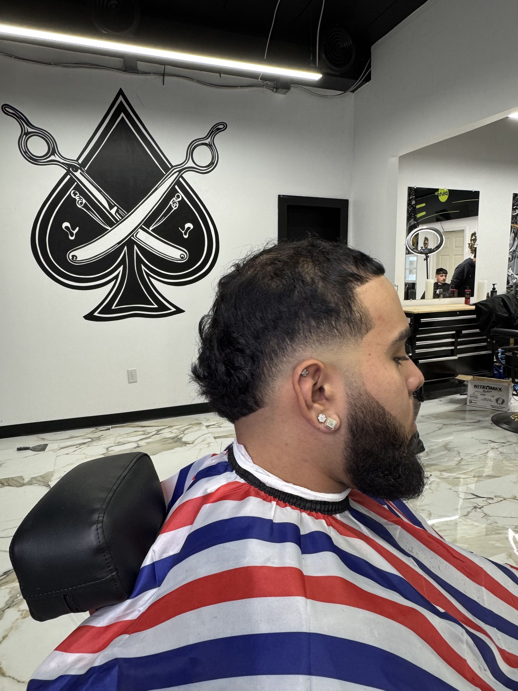 Haircut with fade and beard by Juju Fades at Ace’s Barbershop